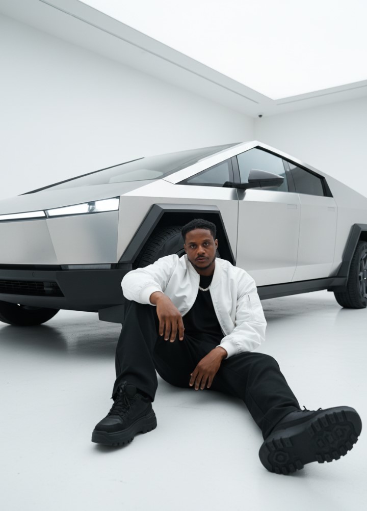 Lifestyle portrait beside a futuristic vehicle